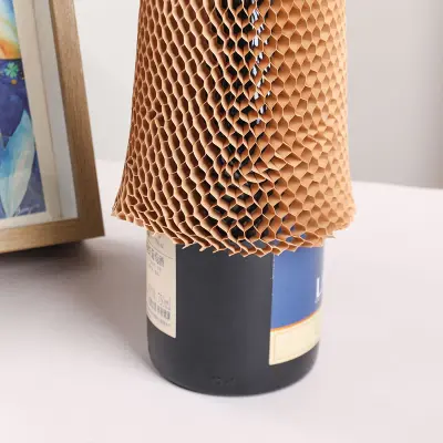 Manche de bouteille en papier en nid d'abeille